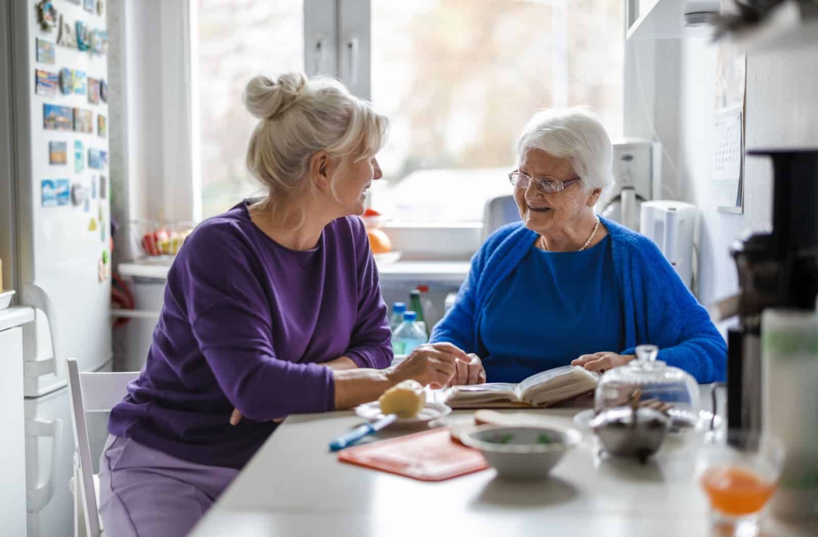 A mature woman enjoying her time while she cares for her mother with dementia.